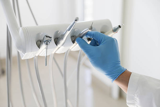 Professional Tooth Extraction technician working in Shelby, MI